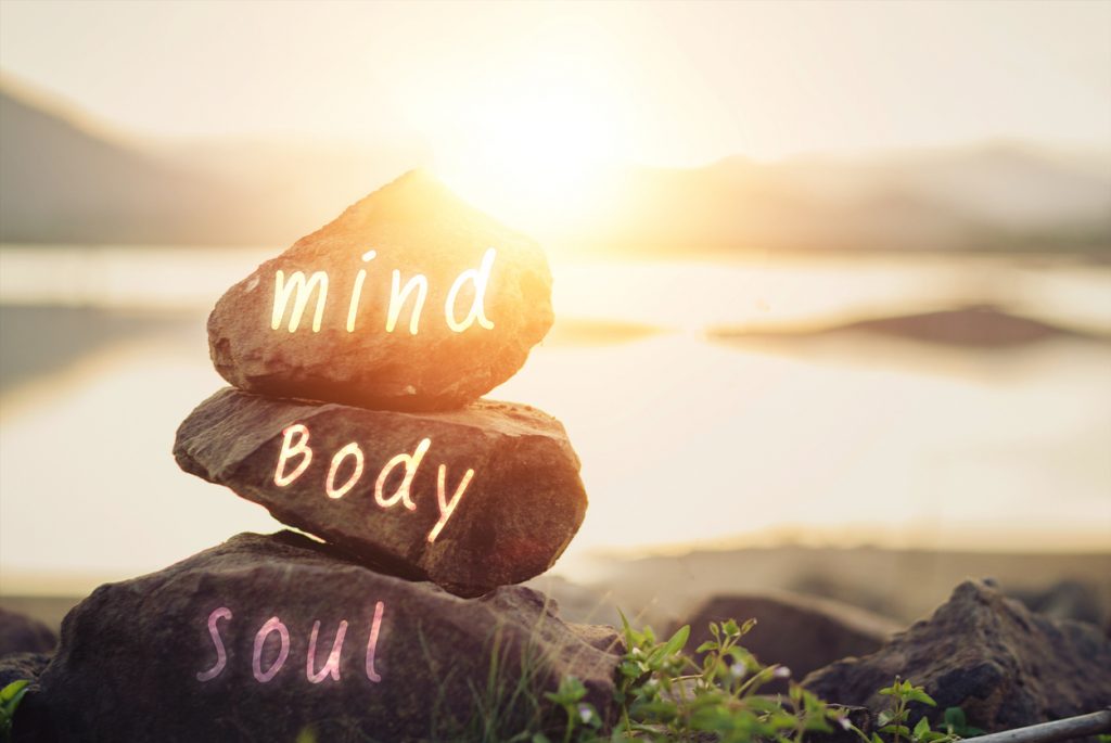 stones that read "mind," "body," and "soul" | massage Touch Therapy